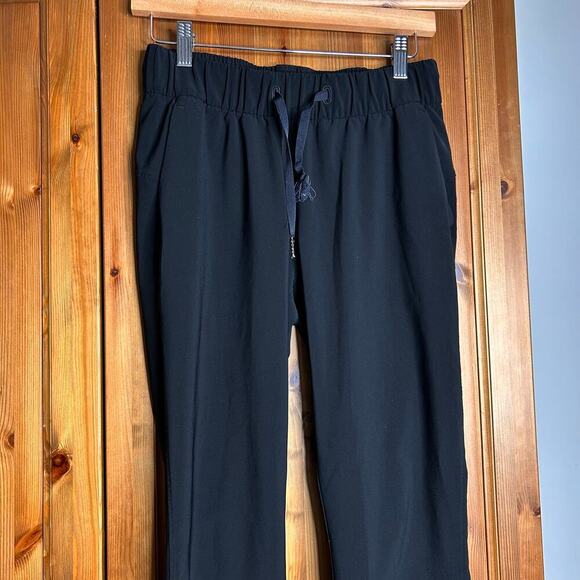 Lululemon On The Fly Pant Women’s 4 Black Athleisure Neutral Minimalist Casual - Picture 6 of 9